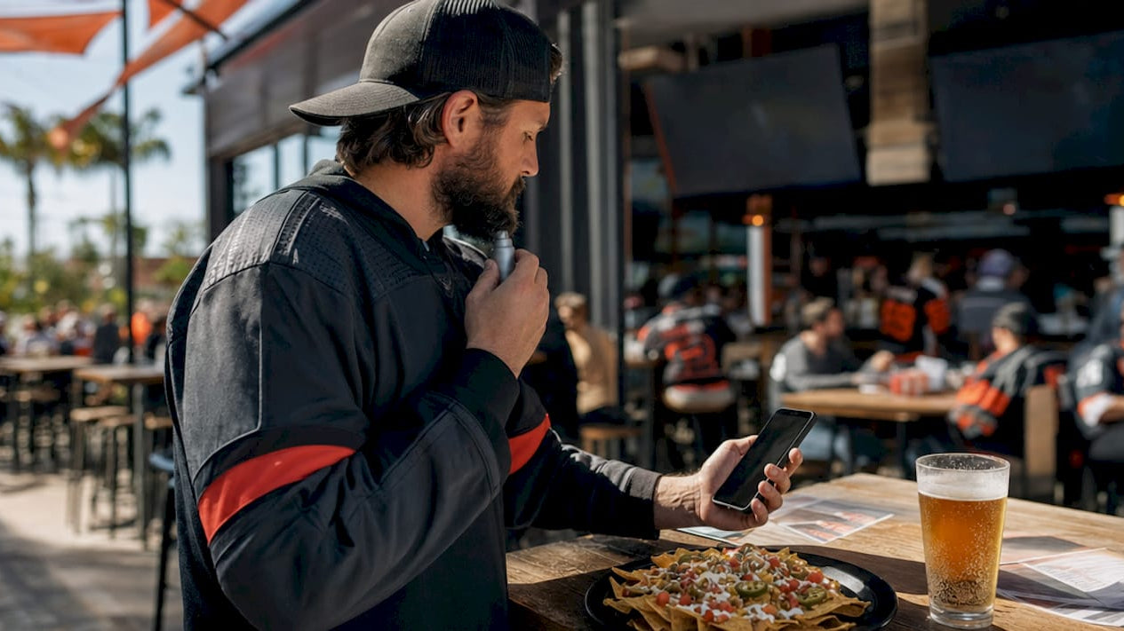 Hockey fan engaging with merchandise and fan rituals