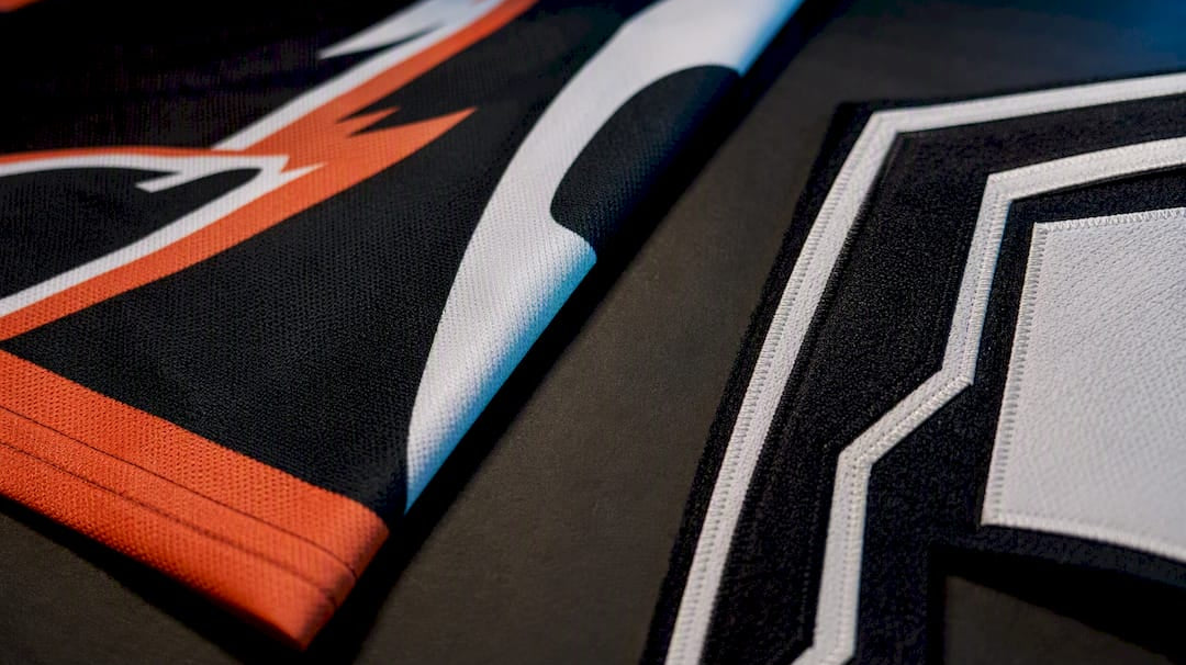 Sublimated and tackle twill fabric details