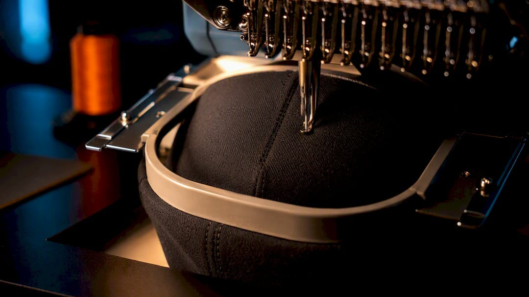 Close-up of precise hat embroidery placement