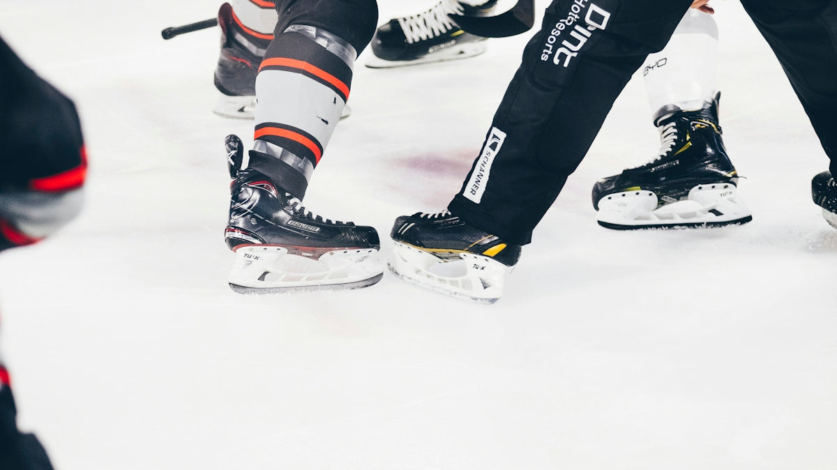 men playing hockey