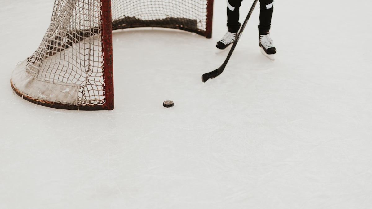 person playing ice hockey