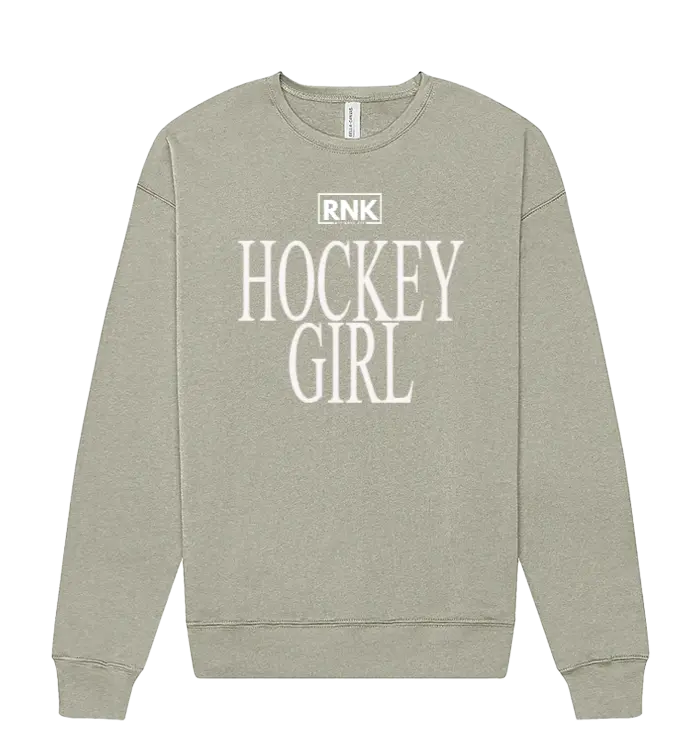 RNK Unisex fleece crewneck sweatshirt with hockey girl graphic, soft fabric, and casual fit, perfect for comfortable winter wear.