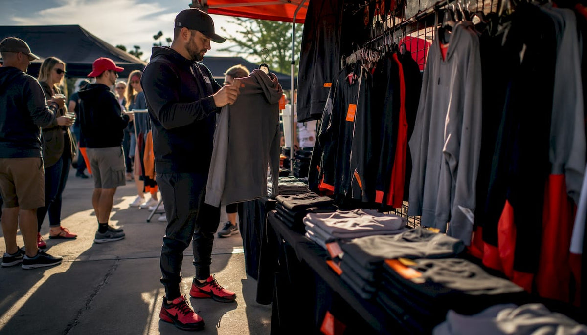 Team manager examining youth hockey hoodie sample