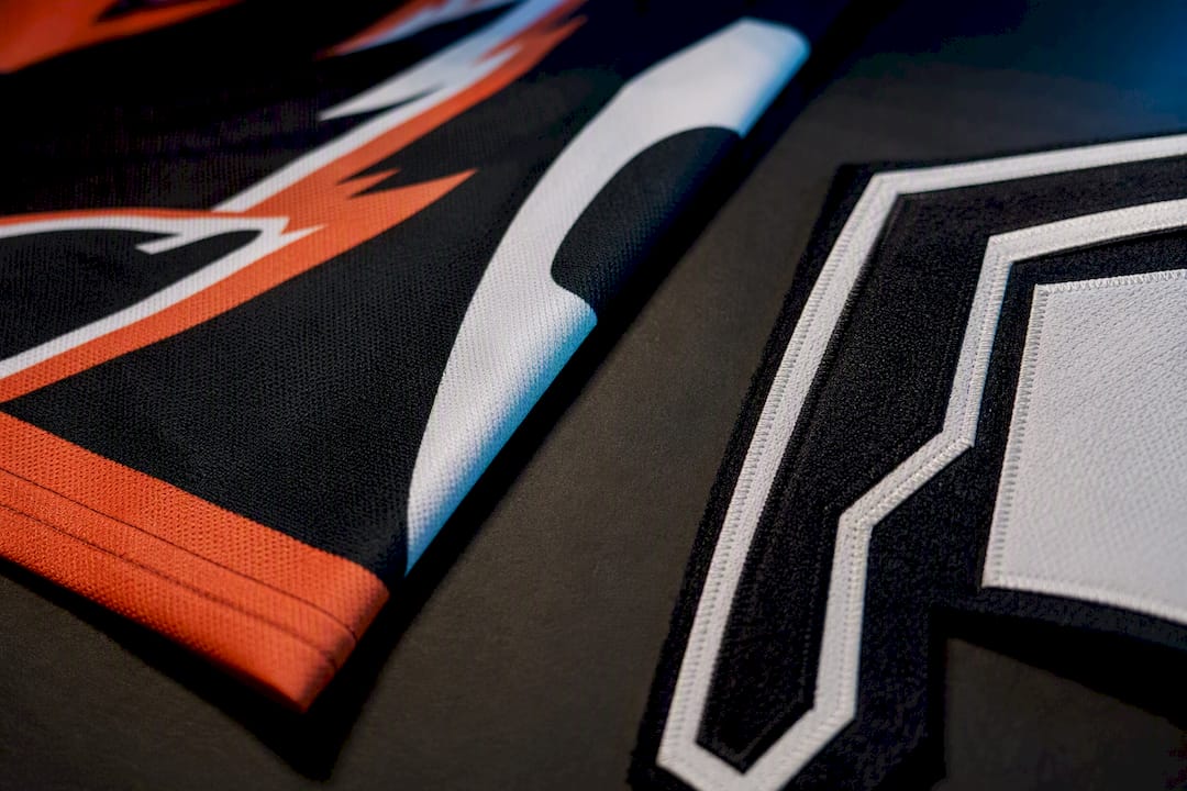 Sublimated and tackle twill fabric details